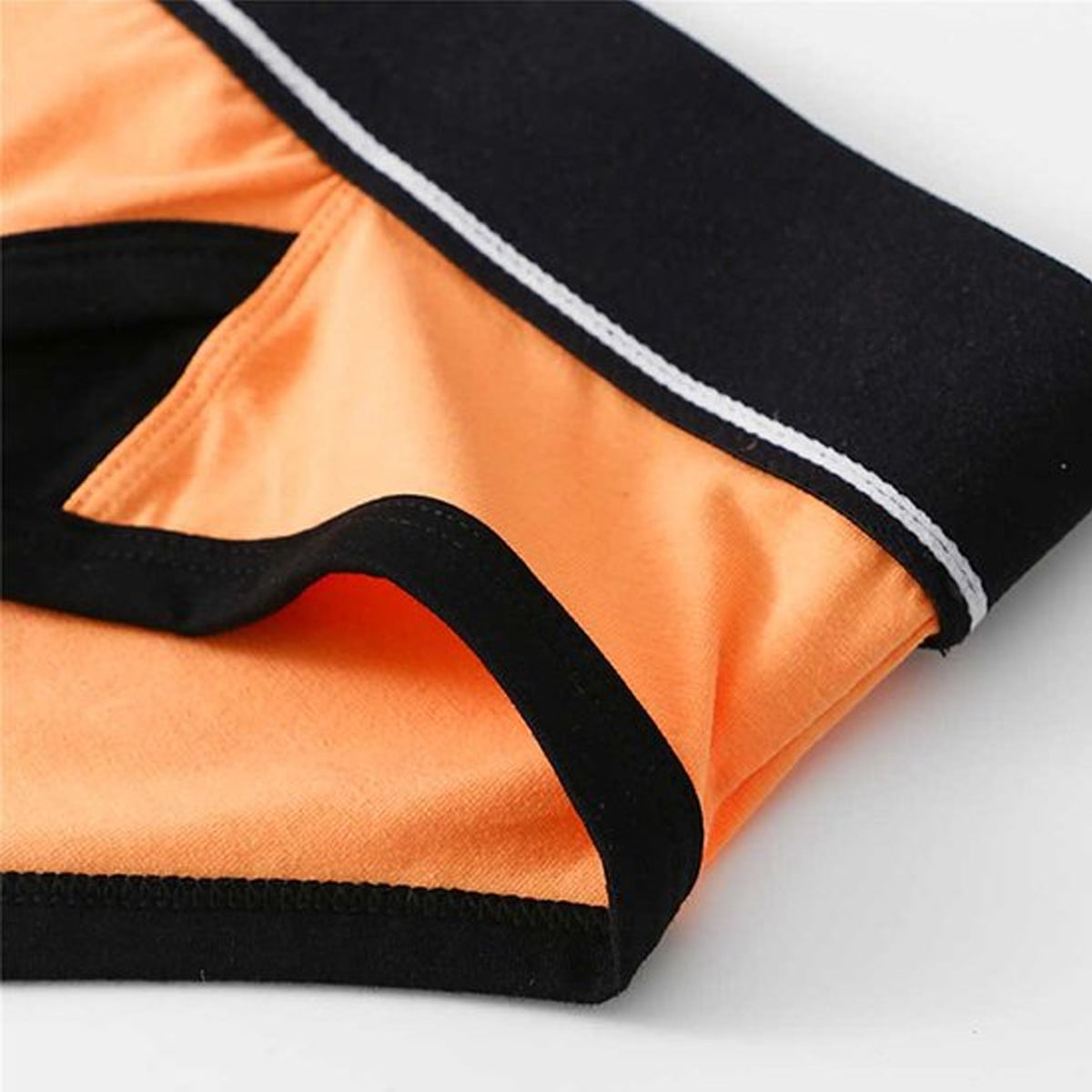 Oranje strakke heren slip met penis gat